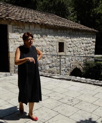 Eleni on the field (in 2019 in front of the mill chosen for the welcome party in Croatia) 